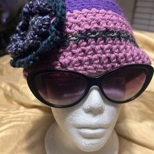 Chic Purple Crochet Hat with Black Floral Accent, handmade.